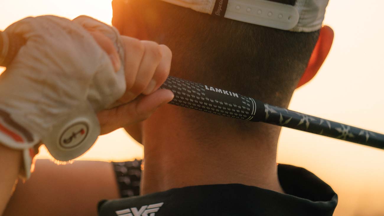 golfer using the Crossline 360 Genesis Full Cord grip from Lamkin