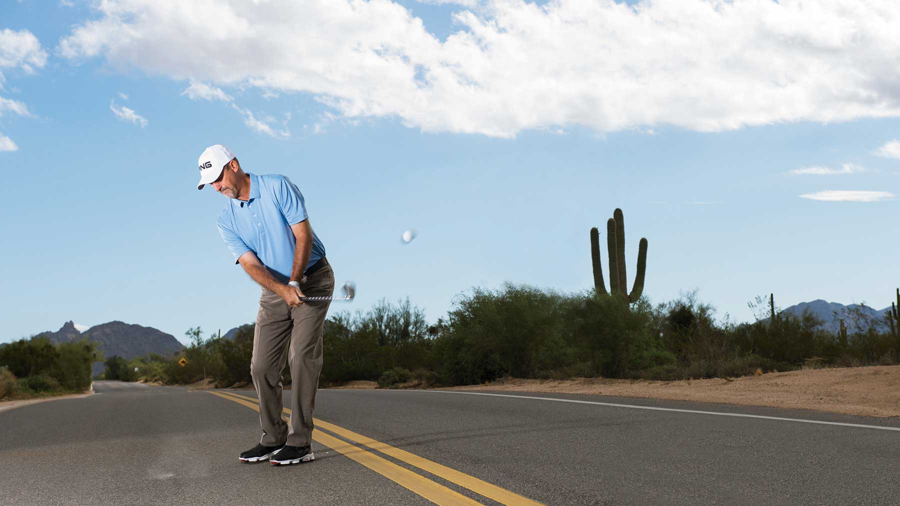 Stan Utley pitching on a desert highway