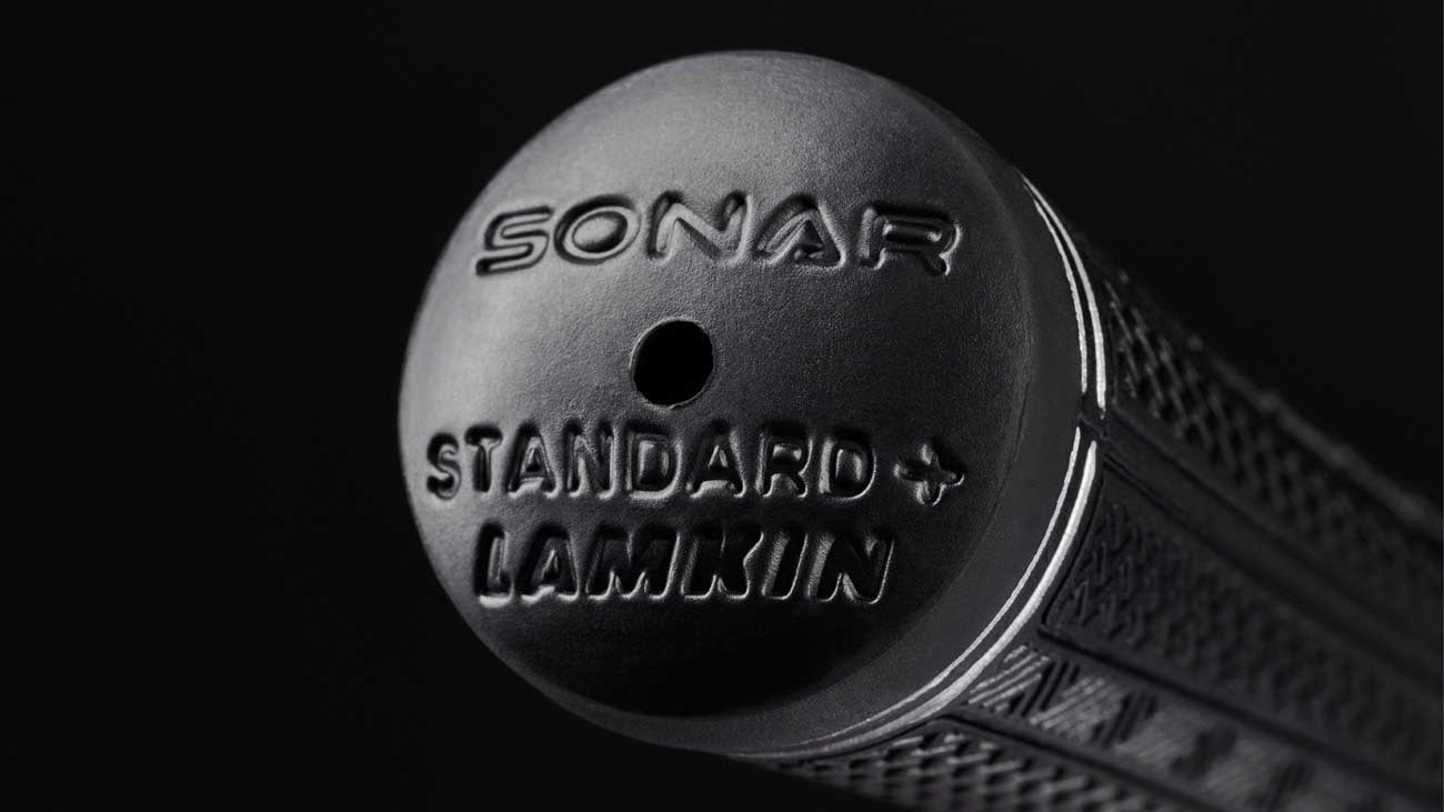 closeup of the end cap of a Sonar+ Black grip from Lamkin Golf Gripsl