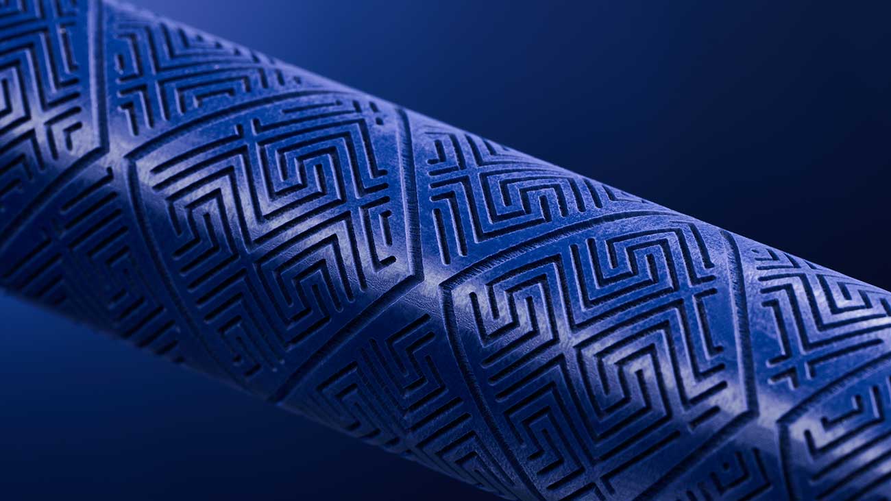 closeup of the texture of a Deep Etched Sink Fit putter grip in blue from Lamkin Golf Grips